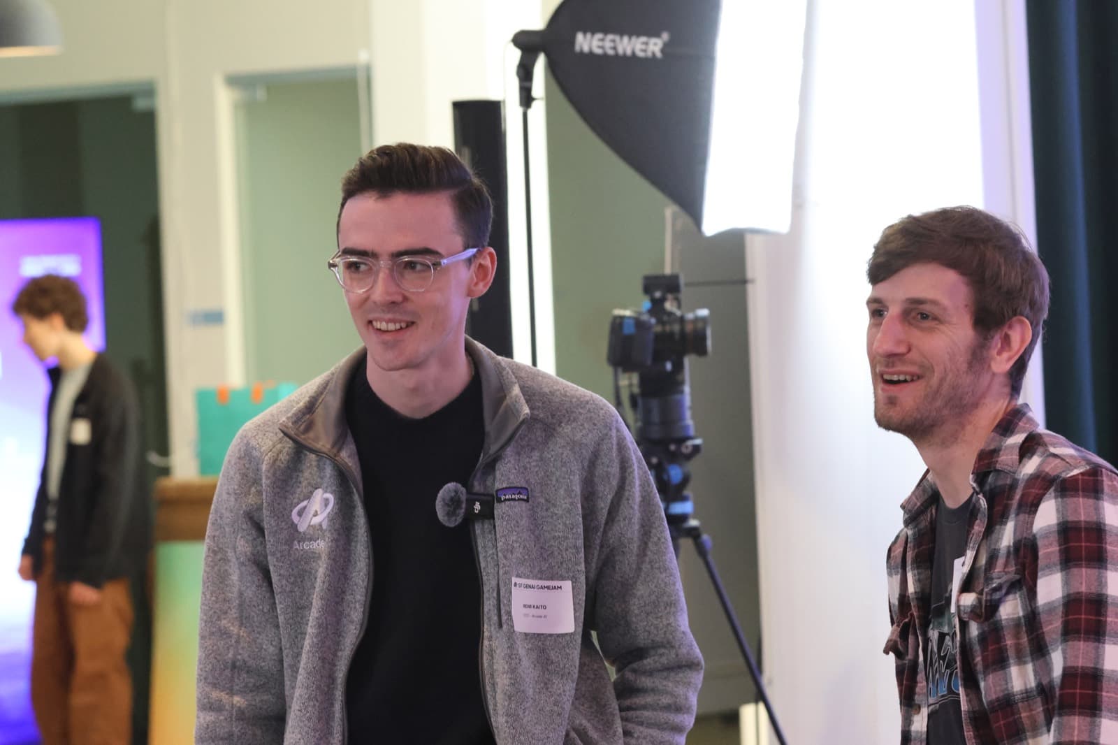 Remi giving a talk at a hackathon